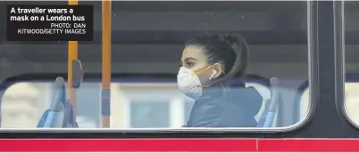  ?? PHOTO: DAN KITWOOD/GETTY IMAGES ?? A traveller wears a mask on a London bus