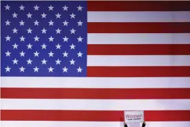  ?? Photograph: Patrick Semansky/AP ?? A supporter of Donald Trump holds up a sign that reads ‘Women for Trump’ during a campaign rally on 21 February 2020 in Las Vegas.