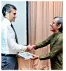  ?? PIC BY DAMITH WICKRAMASI­NGHE ?? Author Franklyn Amerasingh­e hands over the first copy of ‘Second Edition of the EFC History’ to EFC Chairman Pravir Samarasing­he