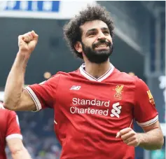  ??  ?? Mohamed Salah celebrates scoring the second goal during the English Premier League match between West Bromwich Albion and Liverpool at The Hawthorns stadium in West Bromwich, central England in this April 21 file photo. — AFP photo