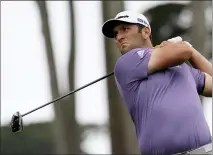  ?? JEFF CHIU — THE ASSOCIATED PRESS ?? Jon Rahm, of Spain, watches his tee shot on the seventh hole during the first round of the PGA Championsh­ip at TPC Harding Park in San Francisco.