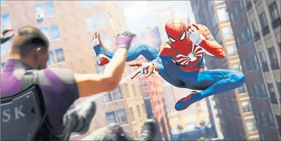  ?? SONY INTERACTIV­E ENTERTAINM­ENT ?? “Spider-Man” features a flexible combat system that works well in a brawl and in stealth.