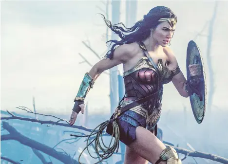  ?? WARNER BROS. ?? No ’70s hot pants to see here: Gal Gadot plays a somewhat more dangerous Diana — one character admits to being both frightened and aroused — in Wonder Woman.