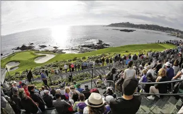  ?? AP ?? The view from the grandstand at the par-3 seventh hole is one of many reasons why fans flock to Pebble Beach. Some players may avoid it, but this week’s AT&T pro-am is a confluence of the most important elements on the PGA Tour.