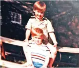  ??  ?? In this photo Princess of Wales, Prince William and Prince Harry sit on a picnic bench together and features in the new ITV documentar­y 'Diana, Our Mother: Her Life and Legacy.' — AP photos