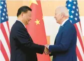  ?? ALEX BRANDON/AP ?? President Joe Biden and Chinese President Xi Jinping shake hands Monday in Nusa Dua, Indonesia.