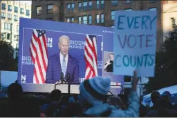  ?? YURI GRIPAS/ABACA PRESS ?? Democratic presidenti­al candidate Joe Biden is seen speaking on a giant screen during a watch party near the White House in Washington, D.C. on Wednesday. In the months leading up to the election, the United States has grown more polarized, the Los Angeles Times claims.