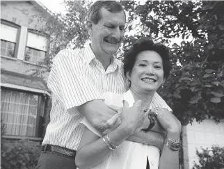  ?? DAVE CHAN ?? Thu Kim Humphreys with her husband Alan at their home in Orléans in a 1999 photo. She was one of the Vietnamese refugees who came to Ottawa as part of Project 4000 back in 1979.