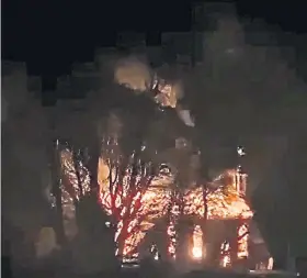  ?? ?? UP IN SMOKE: Reports last night suggested Lundie Church has been destroyed in the fire.