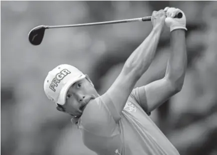  ?? Stephen B. Morton, The Associated Press ?? Japan’s Satoshi Kodaira watches his drive Sunday off the 16th tee in the final round of the RBC Heritage tournament in Hilton Head Island, S.C. Kodaira was six shots behind to start the round and won in a playoff.