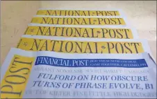  ?? CP PHOTO ?? Copies of the Postmedia-owned newspaper National Post are displayed at a hotel in Burnaby, B.C. Torstar Corp. and Postmedia Network Inc. have signed a deal that will see the companies swap a number of community and daily newsapers.