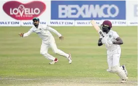  ?? CONTRIBUTE­D ?? Windies middle-order batsman Nkrumah Bonner plays a shot in his opening innings of the second Test match against hosts Bangladesh in Dhaka on February 11.