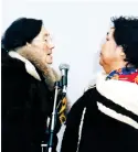  ??  ?? Nellie Nungak (left) and Alacie Tullaugaq practice throat singing ↓