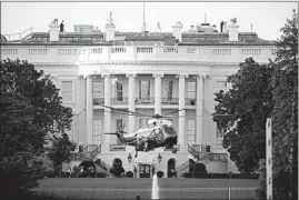  ?? J. SCOTT APPLEWHITE/AP ?? President Donald Trump was reportedly administer­ed oxygen at the White House on Friday before being flown by helicopter to Walter Reed in Bethesda, Maryland.