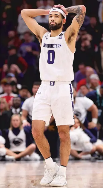  ?? GETTY IMAGES ?? Boo Buie was solid on the defensive end, but the Wildcats fell short in overtime against Penn State.