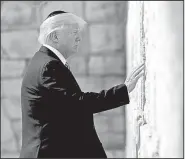  ?? AP/EVAN VUCCI ?? President Donald Trump visits the Western Wall on Monday during his visit to Jerusalem.