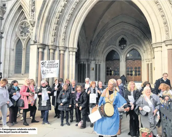  ??  ?? Campaigner­s celebrate outside the Royal Courts of Justice