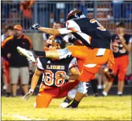  ?? Photo by Randy Moll ?? With Mason Martinez holding, Gravette’s Chris Childress kicks a field goal during the Gravette-Huntsville game on Oct. 21.