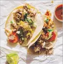  ?? Johnny Autry ?? CARNITAS is among recipes in “The Grand Central Market Cookbook.”