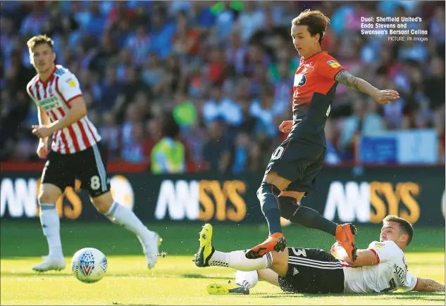  ?? PICTURE: PA Images ?? Duel: Sheffield United’s Enda Stevens and Swansea’s Bersant Celina