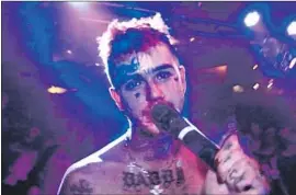  ?? Gunpowder & Sky ?? LIL PEEP, who died at 21, is the focus of a lawsuit and “Everybody’s Everything.”
