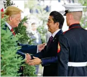  ?? CHIP SOMODEVILL­A/GETTY IMAGES ?? President Donald Trump welcomes Japanese Prime Minister Shinzo Abe to the White House on Thursday. Trump and Abe are expected to discuss the upcoming U.S.-North Korea summit.