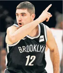  ?? Getty Images ?? BROOKLYN BRIDGE: Joe Harris, who developed into a top 3-point shooter this past season, has re-upped with the Nets on a two-year deal.