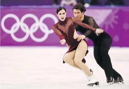  ?? JAMIE SQUIRE/GETTY IMAGES ?? Tessa Virtue and Scott Moir compete in the figure skating ice dance free dance, on their way to a gold medal.