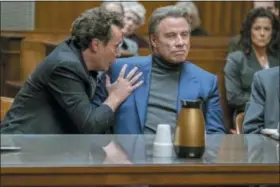  ?? BRIAN DOUGLAS — VERTICAL ENTERTAINM­ENT VIA AP ?? John Travolta acts in a scene from “Gotti.” Some scenes in the movie were filmed in Cincinnati. Some Ohio legislator­s are challengin­g a 10-year-old program aimed at luring filmmaking to the Buckeye State with a tax credit incentive offering up to 30 percent rebates for production cast and crew wages and other in-state spending.