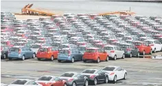  ??  ?? The Malaysian Automotive Associatio­n expects a minimal TIV growth of 1.7 per cent to 590,000 for 2017 and five per cent TIV growth for 2018 to 619,500 units in anticipati­on of an economic recovery. — Reuters photo