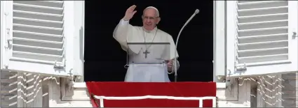  ??  ?? Pope Francis recites the Angelus noon prayer Square, at the Vatican, on Sunday. AP PhoTo/AleSSAnDrA TArAnTIno