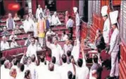  ?? PTI ?? Members of the Opposition protest in the well of the Rajya Sabha on Tuesday.