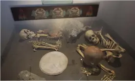  ??  ?? The skeletons of sacrificed Spaniards are displayed inside a glass case at the museum of the Zultepec-Tecoaque archeologi­cal site in Tlaxcala state, Mexico. Photograph: Rebecca Blackwell/AP