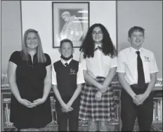  ?? LOANED PHOTO FROM ST. FRANCIS OF ASSISI CATHOLIC SCHOOL ?? THREE OF SLATER’S (FAR LEFT) STUDENTS qualified to participat­e in the Broadcom MASTERS: Brody Amon, Giselle Amezquita and Lucas Freeman.