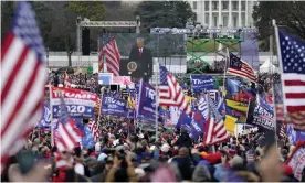  ?? Photograph: Julio Cortez/AP ?? Donald Trump supporters listen at a rally in Washington DC on 6 January.