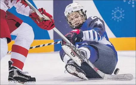  ?? Carlos Gonzalez Minneapoli­s Star Tribune ?? AMANDA KESSEL hits the ice battling against the team of Russian athletes. The Americans, 5-0 winners, face Canada next.