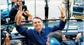  ?? AGENCIA ESTADO / XINHUA / ZUMA PRESS ?? Far-right congressma­n Jair Bolsonaro just missed outright victory in Sunday’s Brazilian presidenti­al vote and will face an Oct. 28 runoff.