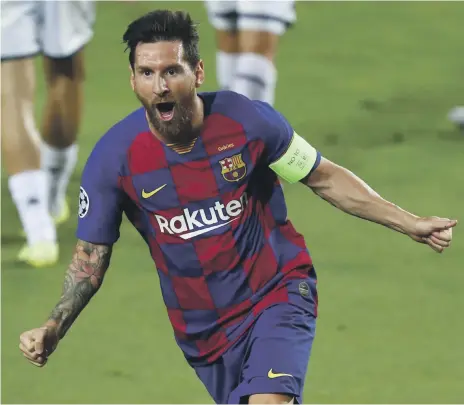  ?? AP ?? Barcelona’s Lionel Messi has agreed to remain at the club but will take a substantia­l pay cut in his new deal