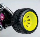  ??  ?? These wide wheels and tires come from Tamiya Stadium Thunder and Blitzer Beetle.