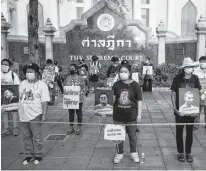  ?? REUTERS ?? The mothers of anti-government protest leaders facing lese majeste charges, Malai Nampha, Sureerat Chiwarak, Yupin Maneewong and Suriya Sithijiraw­attanakul attend a demonstrat­ion demanding the release of their sons outside Remand prison, in Bangkok, Thailand.