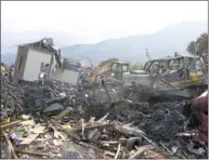  ??  ?? Indonesian search and rescue personnel work on the final day of recovery operations at soil liquefacti­on-hit Balaroa village in Palu.