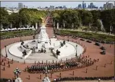  ?? Chip Somodevill­a / Associated Press ?? Queen Elizabeth II’s funeral cortege in London on Sept. 19.