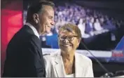  ?? Myung J. Chun Los Angeles Times ?? MAYORAL CANDIDATES Rick Caruso and Karen Bass share a smile after their debate Wednesday.