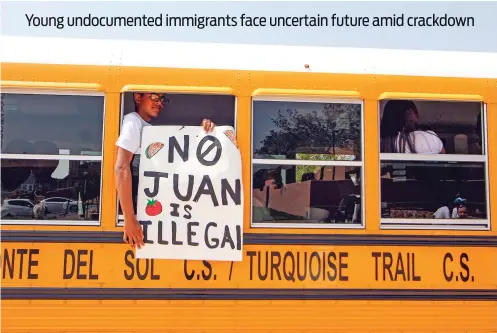  ?? GABRIELA CAMPOS/NEW MEXICAN FILE PHOTO ?? A student from Monte del Sol Charter School protests last September at Santa Fe Community College in support of the Deferred Action for Childhood Arrivals program and young undocument­ed immigrants.