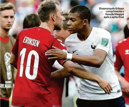  ?? David Vincent/ap ?? Dinamarquê­s Eriksen cumpriment­a o francês Mbappé após o apito final