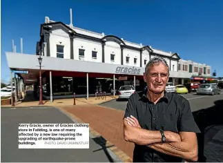  ?? PHOTO: DAVID UNWIN/STUFF ?? Kerry Gracie, owner of Gracies clothing store in Feilding, is one of many affected by a new law requiring the upgrading of earthquake-prone buildings.