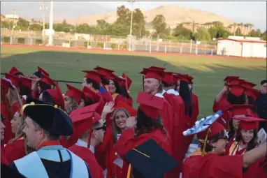  ?? PHOTO FOR THE RECORDER BY JAIME A. HUNT ?? Joyful graduating students during the 94th commenceme­nt speeches at Portervill­e College on Friday, May 13.