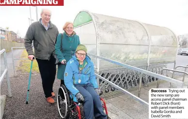  ??  ?? Success Trying out the new ramp are access panel chairman Robert Dick (front) with panel members Isabella Gorska and David Smith