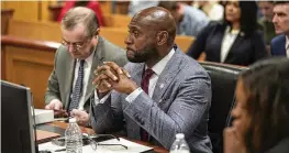  ?? ELIJAH NOUVELAGE / POOL ?? Special prosecutor Nathan Wade listens during a motions hearing for Donald Trump’s election interferen­ce case, in Atlanta, on Jan. 12.