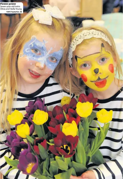 ??  ?? Flower power Seven-year-old twins Olivia and Stella Young
